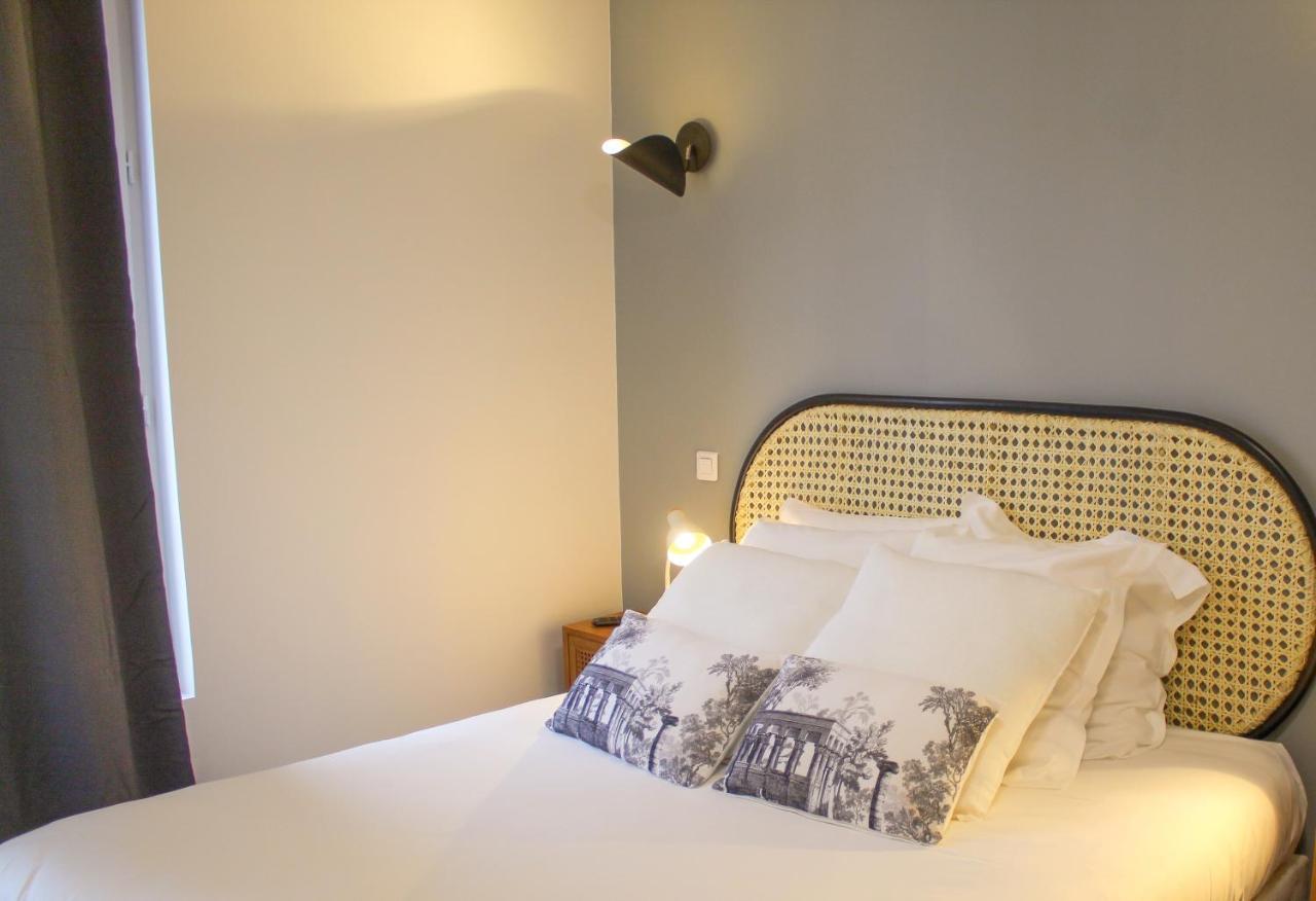 Logis Hotel & Restaurant Du Sauvage La Ferté-Gaucher Szoba fotó